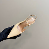 POINTED-TOE HIGH BAMBOO-EFFECT HEEL SLINGBACK IN BEIGE PATENT CALFSKIN